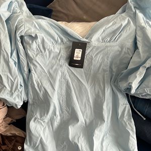 Blue ruffled sleeve dress from fashion nova